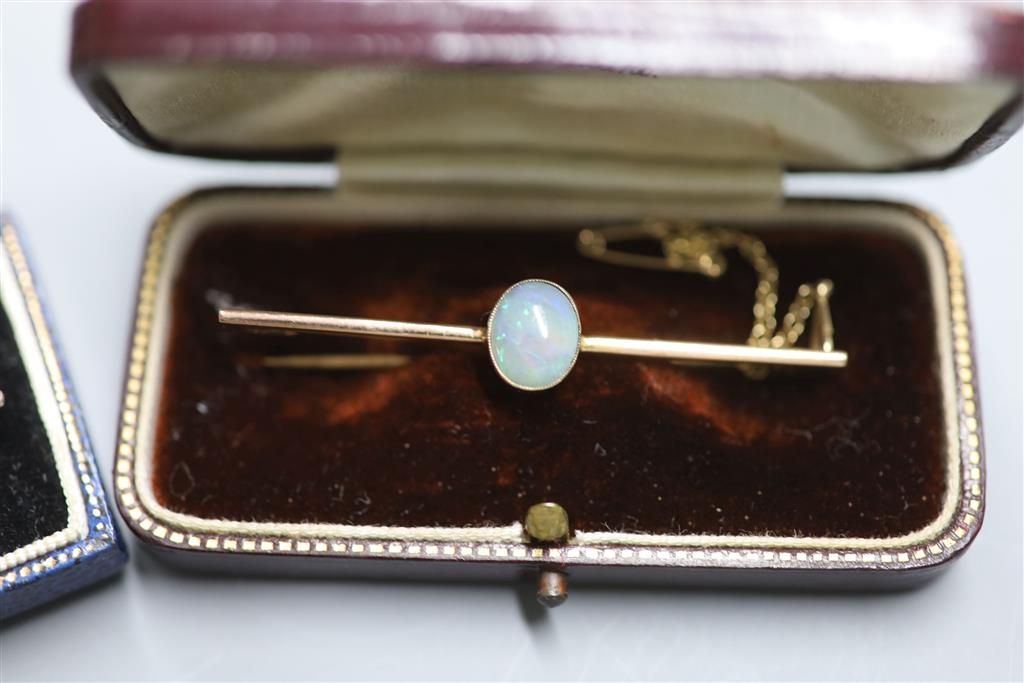 Three assorted Edwardian and later yellow metal bar brooches